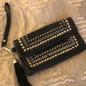 Fold over studded wristlet